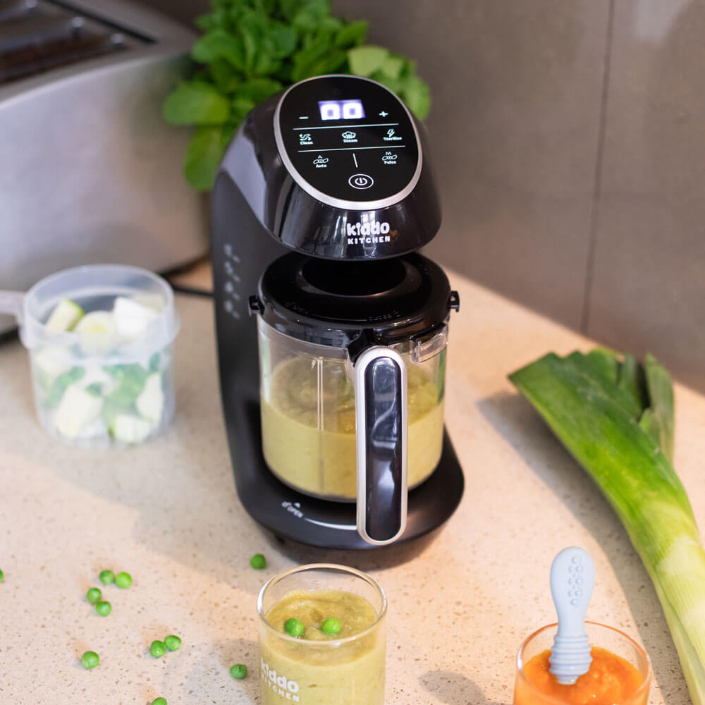 KiddoKook Pro steaming vegetables for homemade baby food